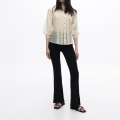 layered embellished translucent shirt