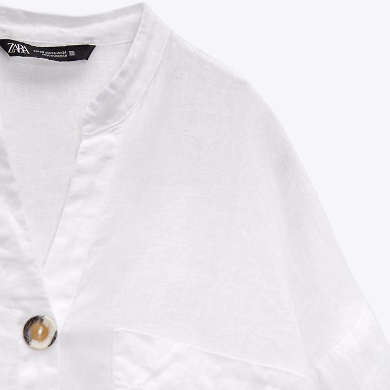 Button-embellished linen top