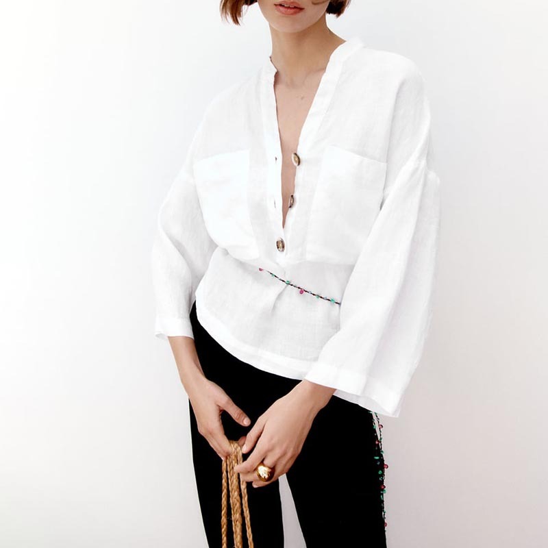 Button-embellished linen top