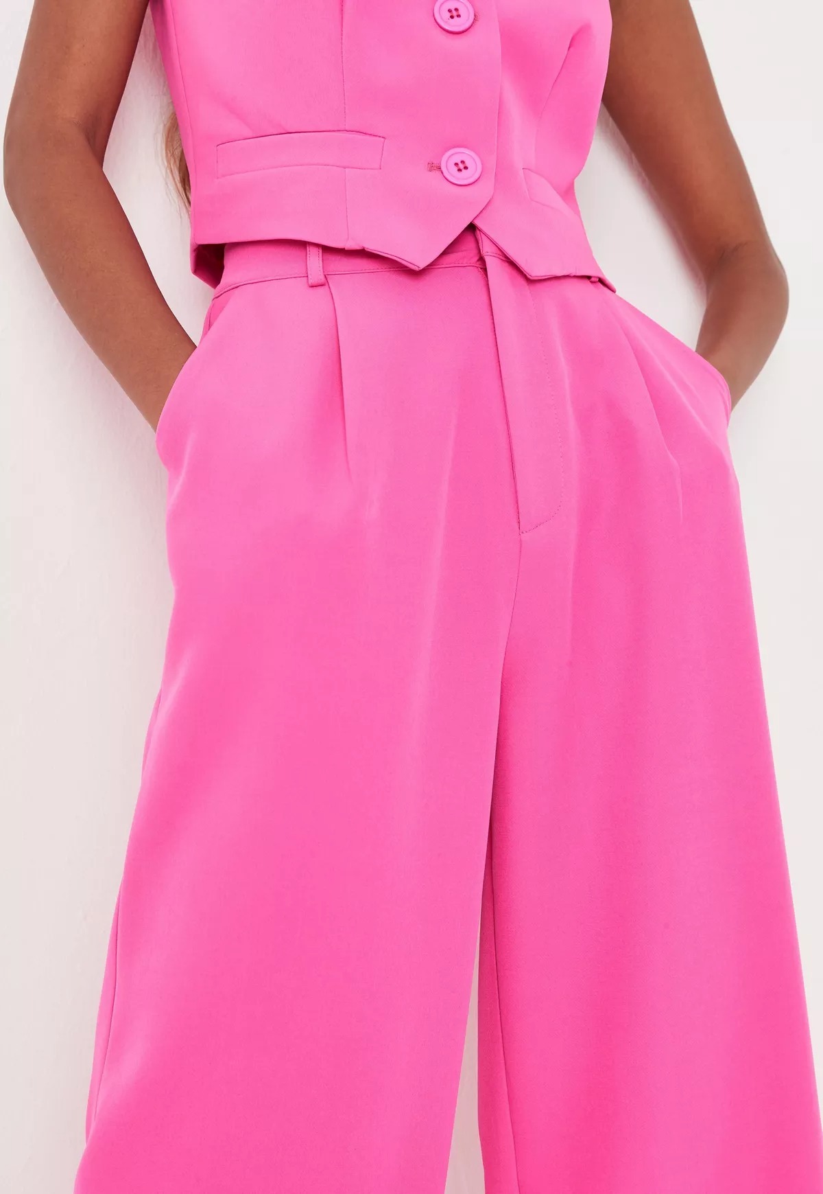 neon pink tailored wide leg trousers
