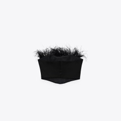Corsetry-Inspired top with feathers