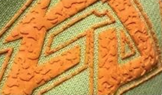Foam printing creating a raised effect on fabric