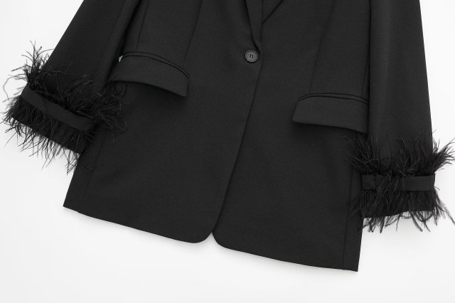 Black suit jacket lady