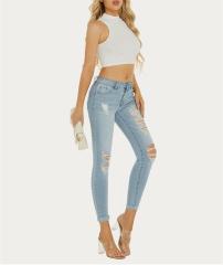 Mid-waist ripped skinny jeans