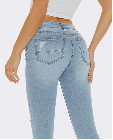 Mid-waist ripped skinny jeans