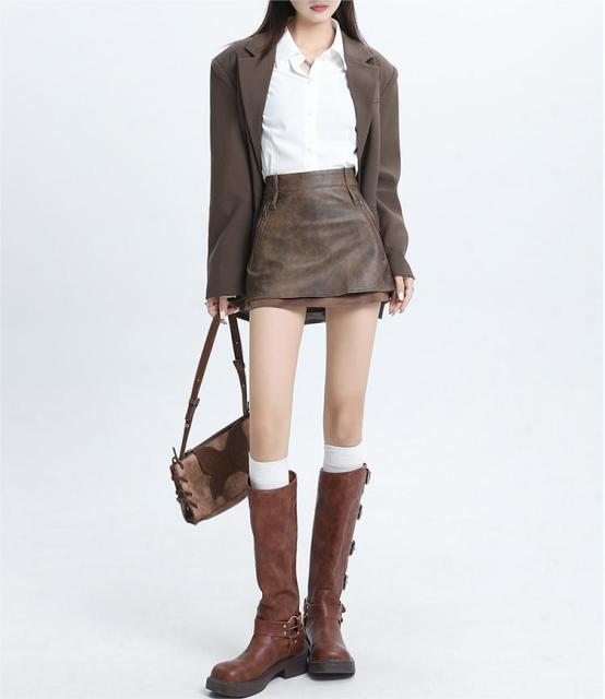 Hottie designs a short leather skirt