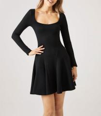 Black dress with waistband and ruffled edges