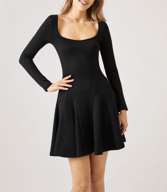 Black dress with waistband and ruffled edges