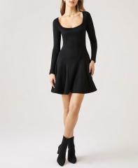 Black dress with waistband and ruffled edges