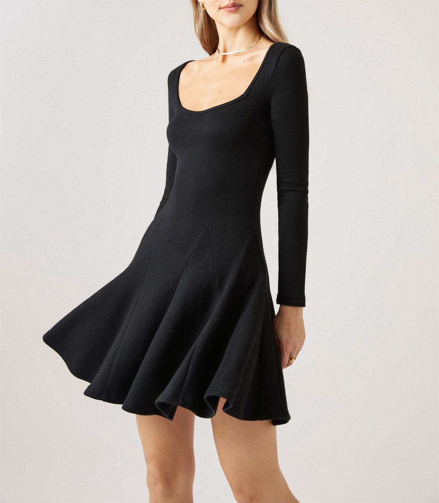 Black dress with waistband and ruffled edges