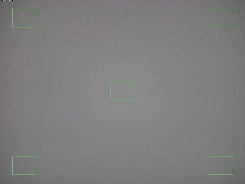Uniform white flat-field target in the light box for shading measurement