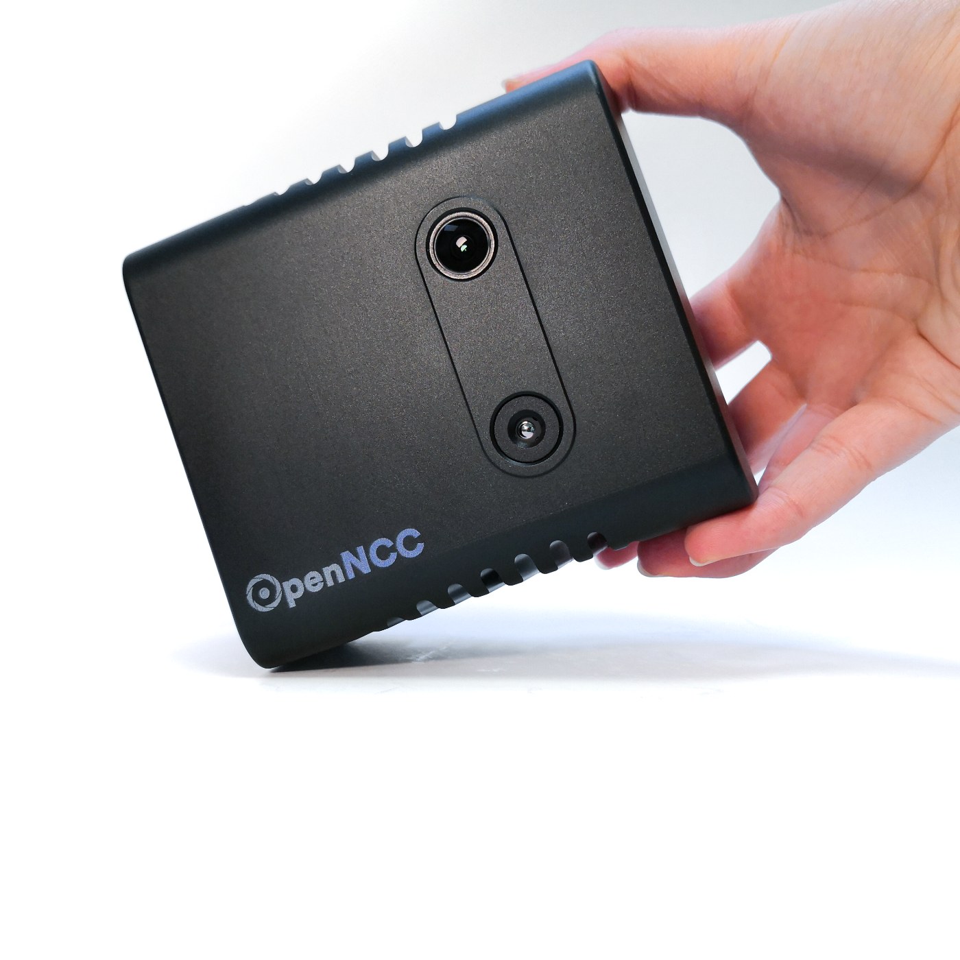 OpenNCC IR384 temperature-measurement camera, front view: compact black housing with thermal lens and visible-light lens, OpenNCC branding