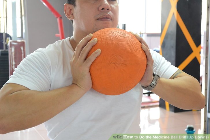 How to Do the Medicine Ball Drill (Up Downs)